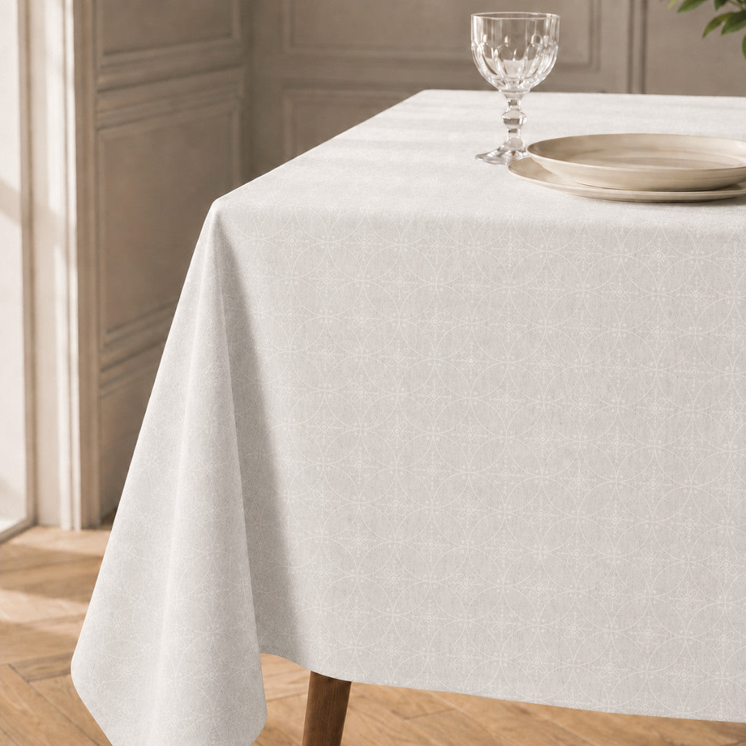 Rivera Blanco – Jacquardvävd textilvaxduk i offwhite 160 cm bred, hörn