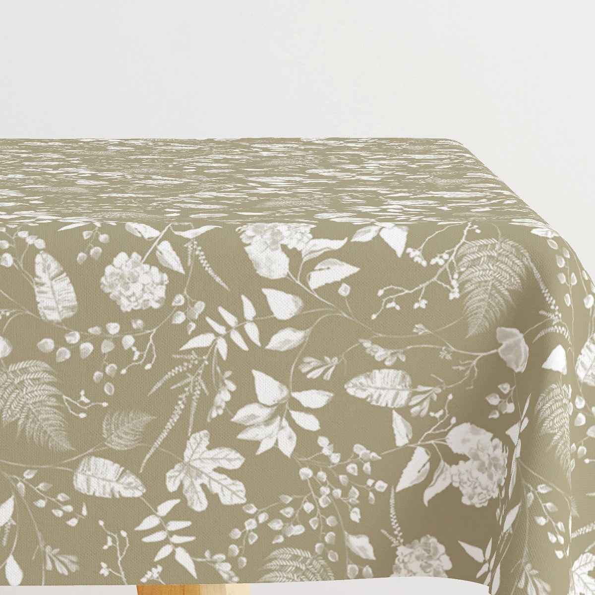 Briulov Visset Grön – textilvaxduk med vita blad och blommor