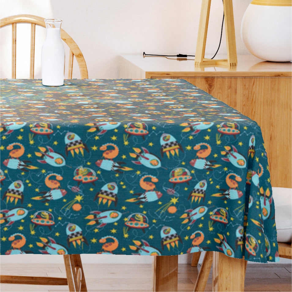 Dinofuzzy Blågrön – Textilvaxduk med rymdskepp, 155 cm bred
