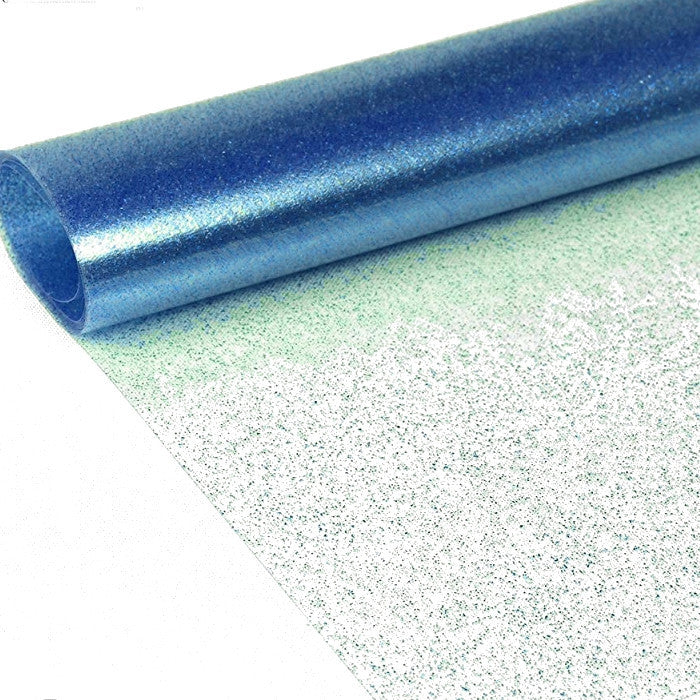 Klar plast med blått glitter Genomskinlig vaxduk