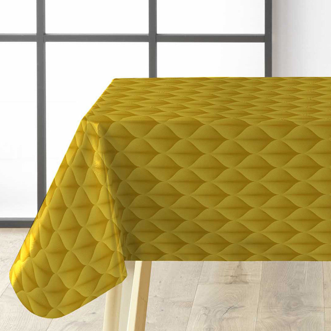 Kalini Luxury Yellow – vaxduk med grafiskt mönster i fantastisk 3D-effekt.på bordet