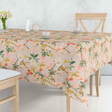 Forårsgren – textilvaxduk i linnelook med blommor och fåglar, 160 cm bred, miljö