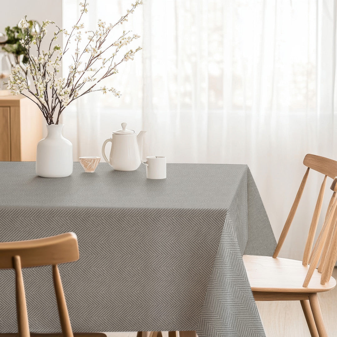 Nagore Gris – textilvaxduk med klassiskt fiskbensmönster hörn