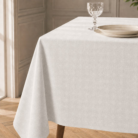 Rivera Blanco – Jacquardvävd textilvaxduk i offwhite 180 cm bred, hörn