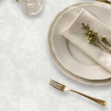 Tamayo Blanco – Jacquardvävd textilvaxduk i offwhite 160 cm bred, närbild