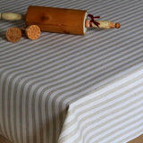 Textilvaxduk i linnelook med randigt i ljus beige