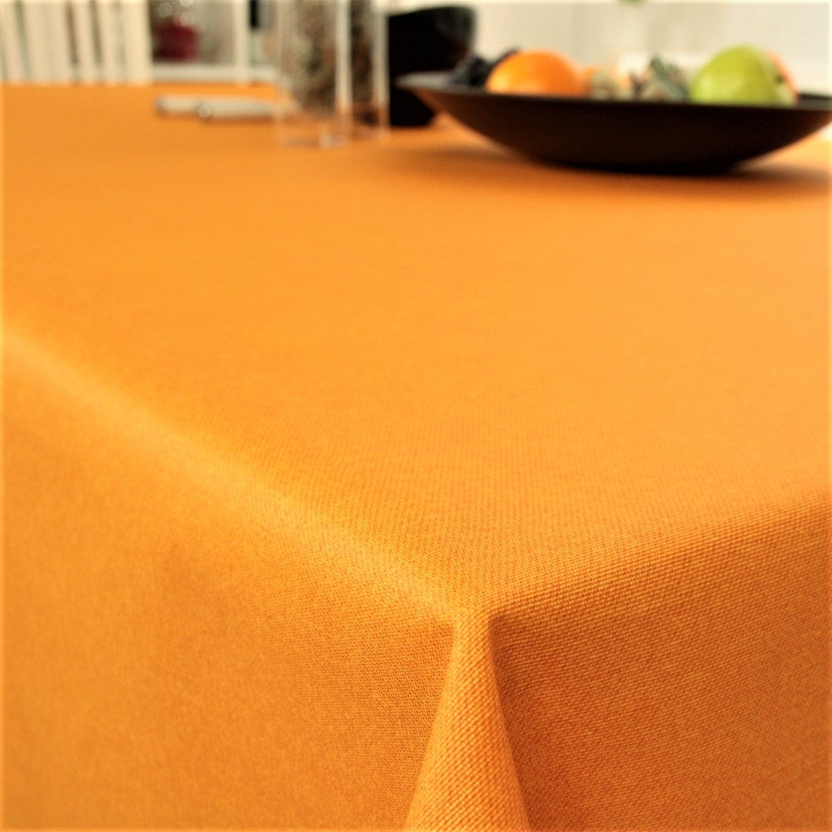 Enfärgad textilvaxduk i färgen orange - Dali, 160 cm bred