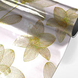 Danela Gold - Transparent vaxduk, konturblommor och glittereffekt, rulle