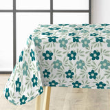 På bordet Flory Blue - Elegant vaxduk med fina blå blommor