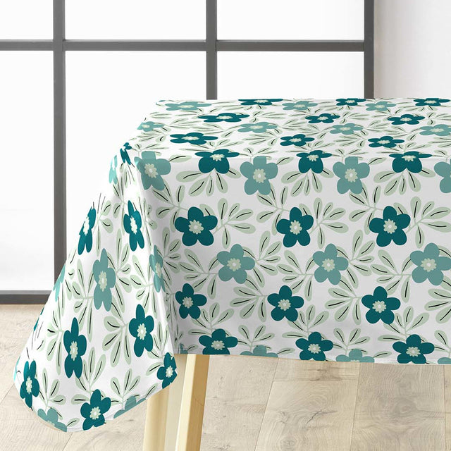 På bordet Flory Blue - Elegant vaxduk med fina blå blommor