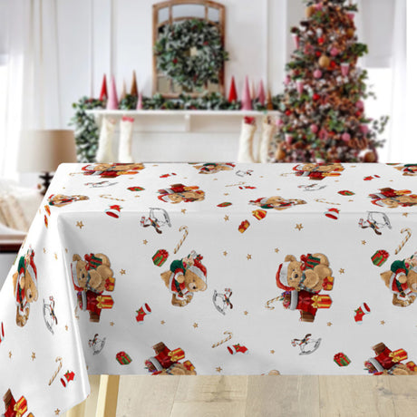 Julduk med söta nallar med tomtekläder och julklappar. På bordet