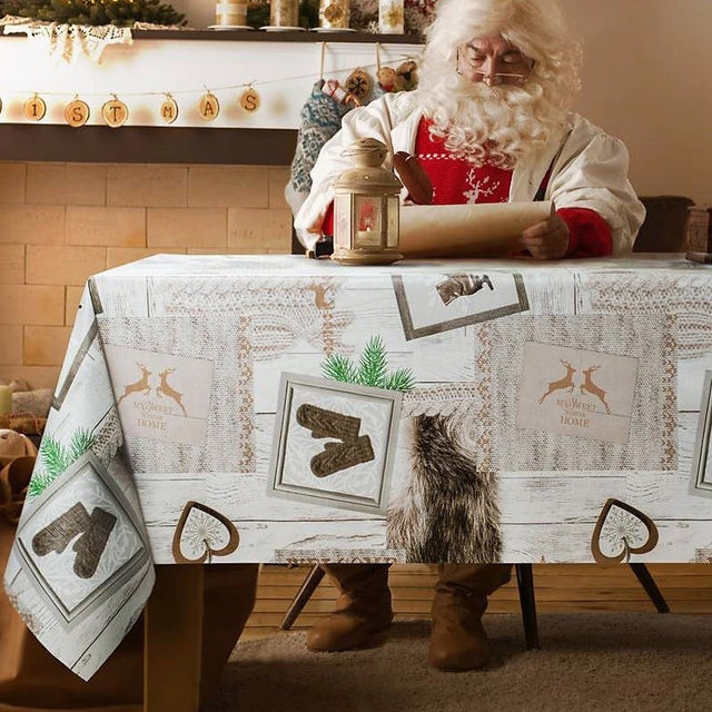 Julvaxduk - Skridskoåkning i juletid. Tomten sitter vid bordet