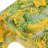 Madeira Yellow - vaxduk med struktur och palmblad på en gul bakgrund närbild