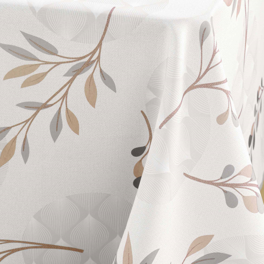 Närbild av Manola Natural dukens bladmönster och textur i beige och grått