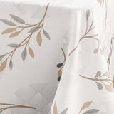Närbild av Manola Natural dukens bladmönster och textur i beige och grått