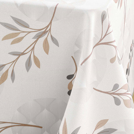 Närbild av Manola Natural dukens bladmönster och textur i beige och grått