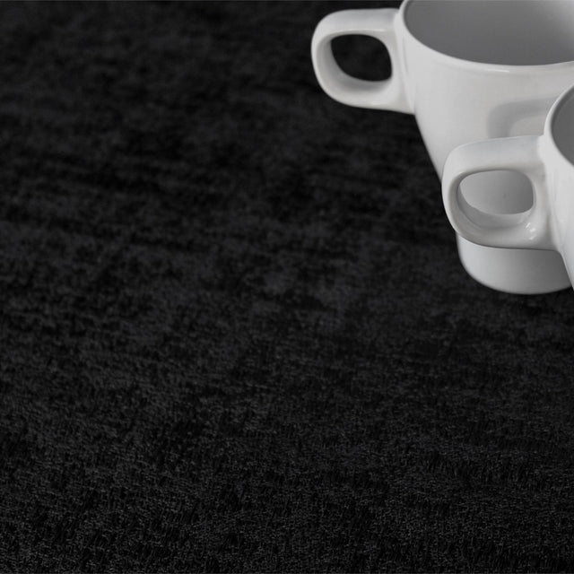 Morillo Luxxus Svart – jacquardvävd textilvaxduk, 140 cm bred