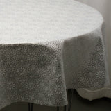 Rund spetsduk, vit med silverblommor