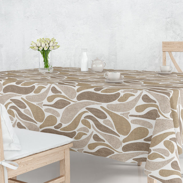 På bordet Sandström - Vaxduk med böljande mönster i beige och naturfärger