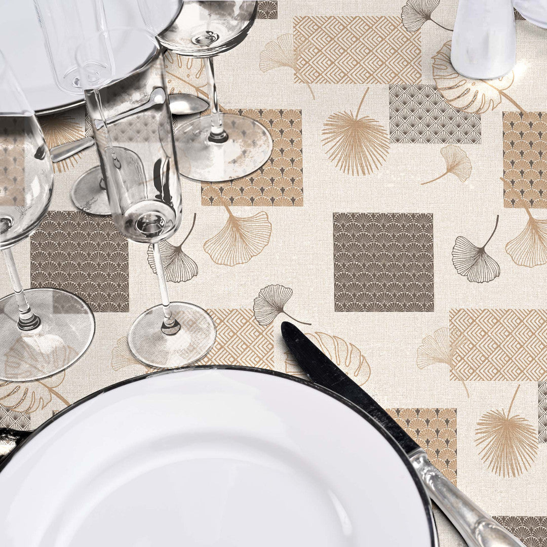 På dukat bord Textilia Glitter Rialto - Vaxduk med blad och art deco-inspirerade rutor