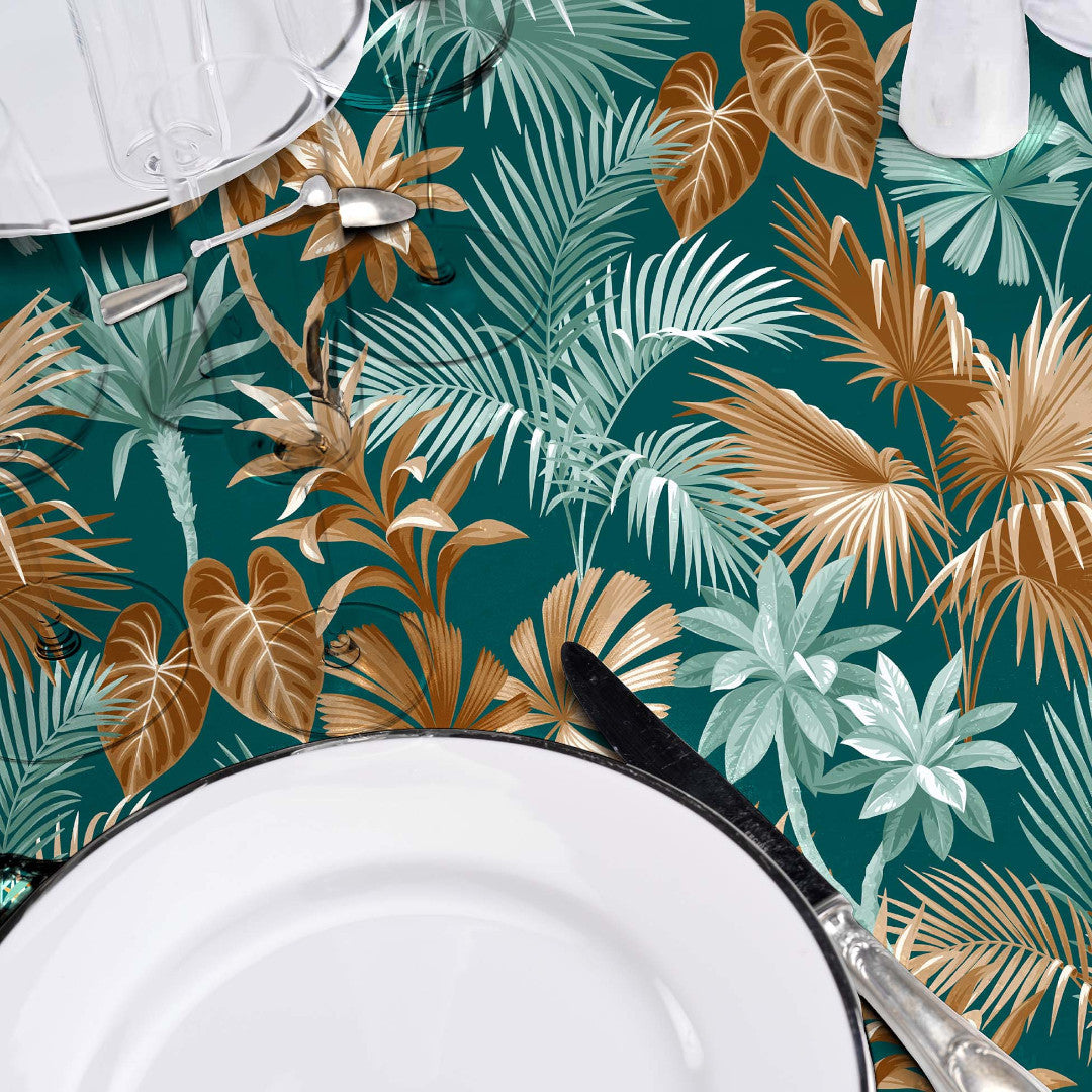 På dukat bord Textilia Riviera Green - Vaxduk med fina tropiska blad