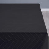 Närbild av Södahl Tiles Ash  klassisk damastvävd textilduk med glidskydd